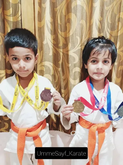Look at these two little champions. Our youngest karatekas showing off their medals with the biggest smiles. This is where the journey begins. 🧡🧡🧡