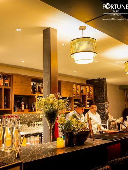 Our bar staff at Nakshatra, working together to serve guests during a busy evening event.