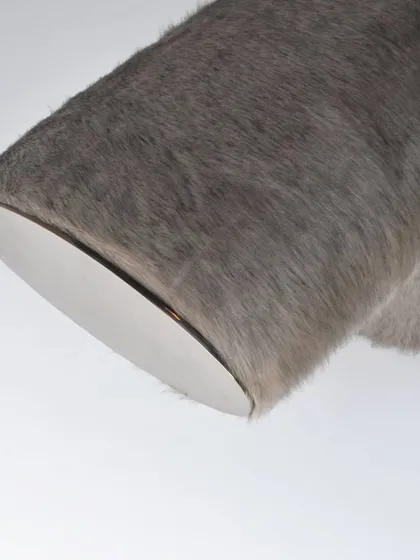 The BRUTE bench is an exploration of haptic, organic design inspired by biomimicry. This detail shows the unique texture of the fur-like upholstery, which invites touch and adds a primal accent to a space.