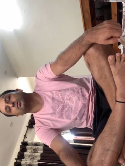 An online client working on a seated hip opening pose. Through live video, I can provide real time feedback on alignment and breathing, just like in an in person session.