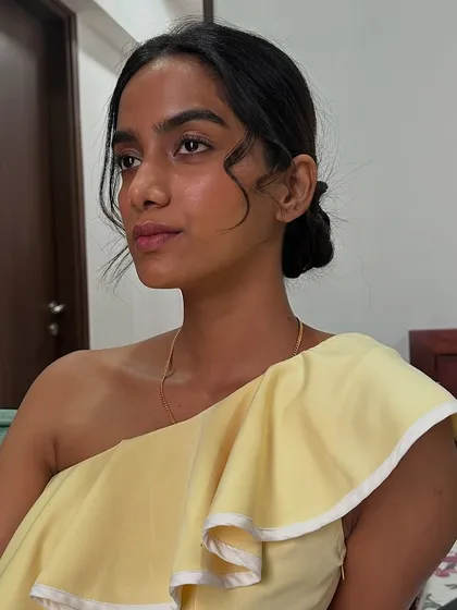A beautiful "no-makeup" makeup look for a brand shoot. The skin looks real and radiant, with just a hint of color to bring out her natural warmth.