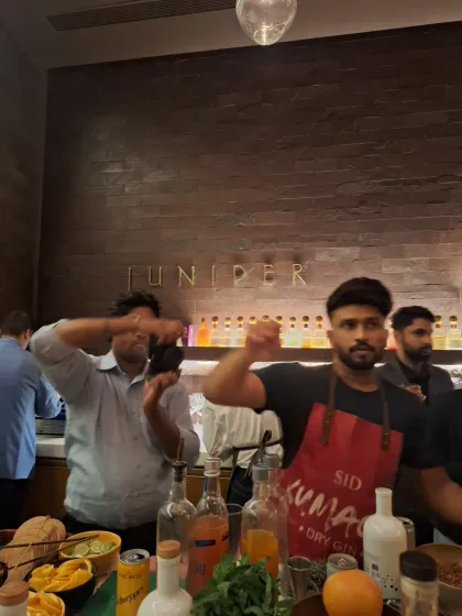 Behind the bar with mixologist Siddhant Hule and photographer Lakshay Sachdeva during the Kumaon & I event.