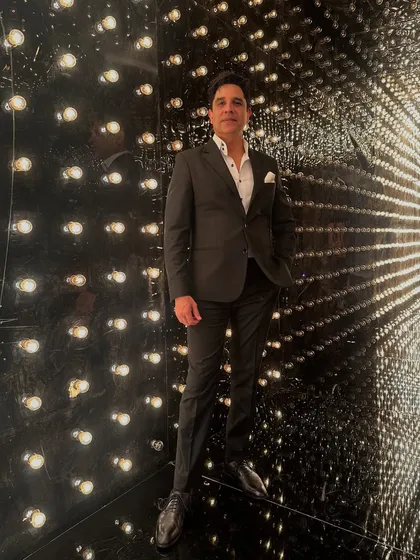 My motto is simple: Raat bhi lit, vibe bhi fit. This photo, taken before a big night, captures the stylish and focused energy I bring to every event, ensuring the atmosphere is just right.