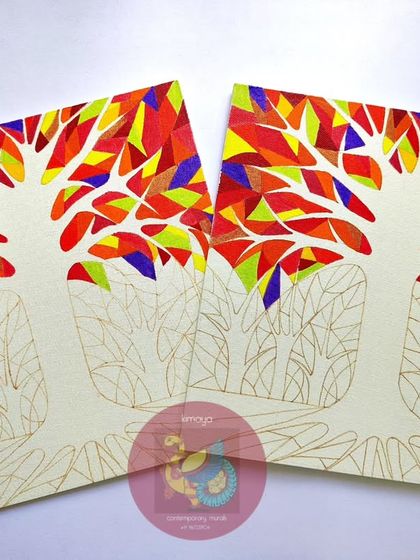 The "Tree of Life" paintings in an early stage. The outlines are done, and I've started filling in the vibrant, warm colors of the leaves, creating the stained-glass effect piece by piece.