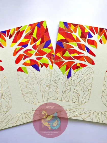 The "Tree of Life" paintings in an early stage. The outlines are done, and I've started filling in the vibrant, warm colors of the leaves, creating the stained-glass effect piece by piece.