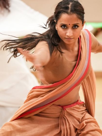 An intense, action-oriented shot from rehearsals. This captures the raw energy and focus required during the creation process.