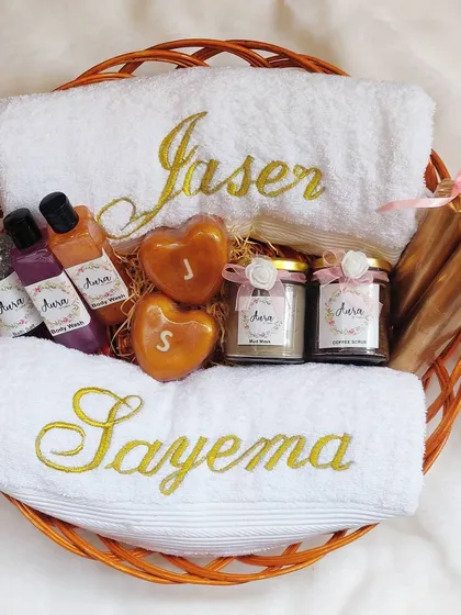 Here is another luxury spa hamper I created for a bride-to-be. This basket is filled with personalized towels, body washes, initial soaps, mud masks, and candles for ultimate pre-wedding pampering.