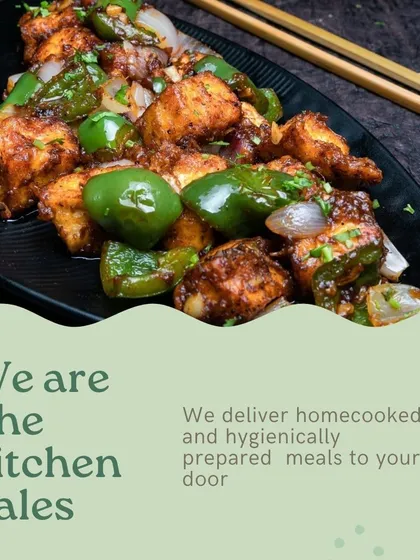 We deliver hygienically prepared meals to your door. This image features our delicious Chilli Paneer, a semi-dry preparation with chunks of soft paneer and crisp capsicum, perfect with rotis or as a starter.