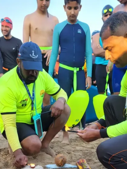 A pre-swim ritual on the beach. We respect the ocean and prepare ourselves mentally and spiritually before every major challenge.