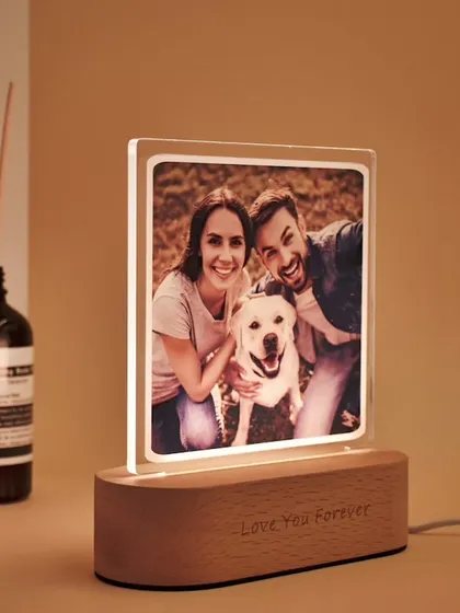 This elegant photo night light features your picture on an acrylic slide that fits into a lighted wooden base. I can also engrave a short message like "Love You Forever" on the base for an extra personal touch.