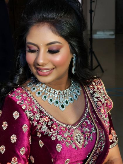 Gorgeous Remya, ready for her Sangeet. I created a glamorous look for her with smokey eyes and a beautiful diamond and emerald necklace.