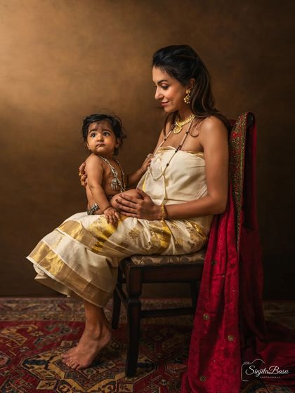 Dressed in a traditional Kerala saree, this mother and child create a stunning, culturally rich portrait. The studio allows me to control the light to highlight the textures and emotions perfectly.