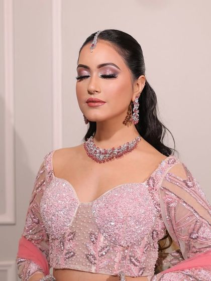 A close-up of this beautiful engagement bride. The soft pink eyeshadow and flawless skin create a romantic and dreamy look.