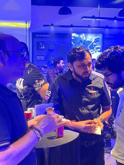 The lively atmosphere at the Triumph motorcycle launch event, fueled by our delicious food and drinks. We help make corporate events a memorable success.