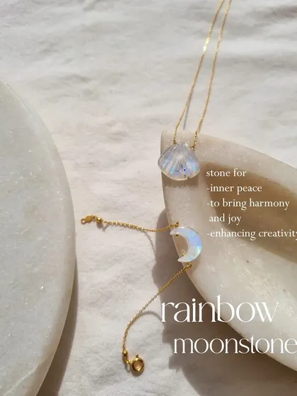 My rainbow moonstone shell and crescent pendants. This stone is for inner peace, harmony, and enhancing creativity.