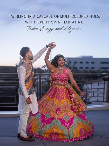Twirling in a cascade of multi-colored hues. For their Sangeet, we styled the bride in a vibrant lehenga and the groom in a complementary patched Nehru jacket, radiating festive energy.