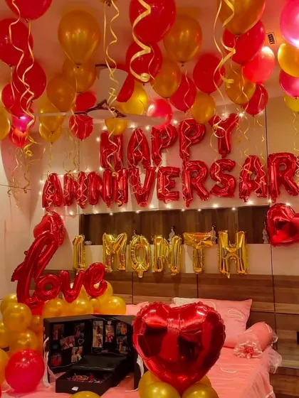 Celebrate your first month together with this sweet and romantic room setup. I used gold and red balloons and foil letters to spell out "1 MONTH" and "LOVE," creating a personal and memorable surprise.