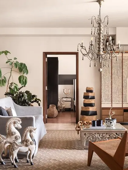 This living room is an expression of our love for Wabi-Sabi interiors, where beauty is found in imperfection and authenticity. We layered textures, collected art, and vintage pieces to craft a home with soul, filled with objects that tell a personal story.