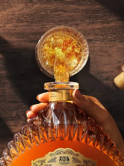 I always wanted to capture a pour from this top-down perspective. It’s much harder than it looks! This shot for Monarch brandy freezes the liquid in mid-air, showing the beautiful chaos and golden color as it splashes into the glass.
