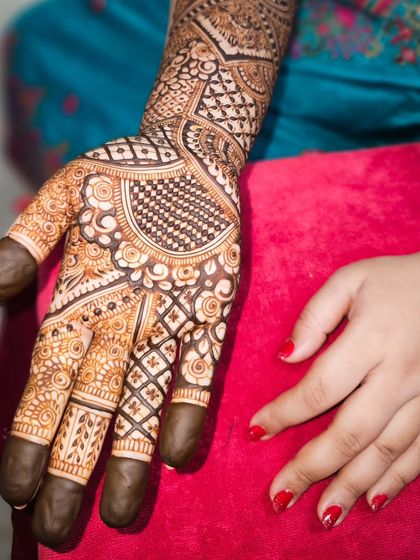 Another angle of the detailed palm work, showing the precision and care in every line.