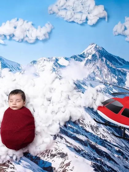 They asked, I delivered. For a family in the aerosports business, we created this custom set with their newborn flying high above the Himalayas.