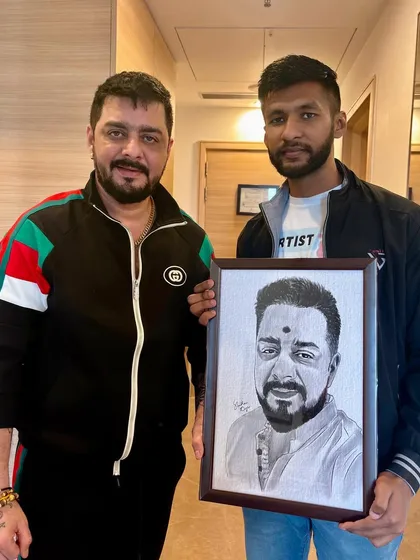 Another shot with Hindustani Bhau and my artwork. He was very welcoming and appreciated the gift.
