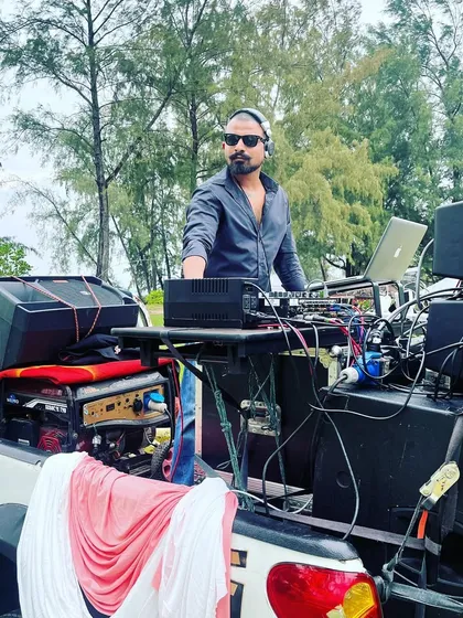 A beachside baraat in Phuket required a creative setup. My mobile DJ truck is perfect for unconventional locations, bringing the party right to the water's edge.