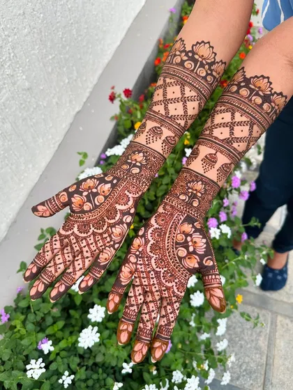 A beautiful floral design with paisley elements, featuring delicate shading and line work that gives the pattern a soft, almost painted appearance.