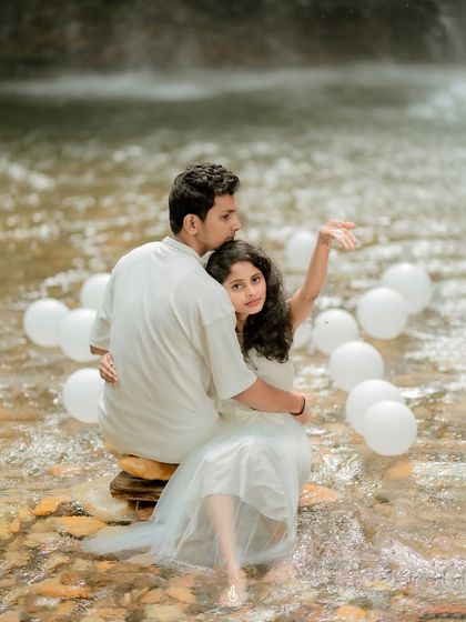 A tender moment sitting on a rock in the stream. The flowing water and gentle pose create a very romantic and artistic image.