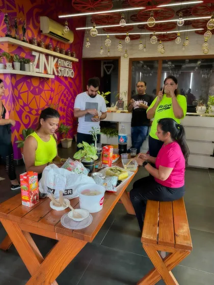 Another angle of our community enjoying a well-deserved meal together in the studio lounge. This is what it's all about.