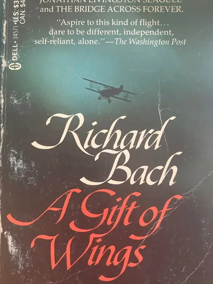 A classic from Richard Bach, 'A Gift of Wings'. It's always wonderful to find older editions of beloved books on our shelves.
