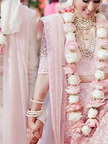 A soft and romantic jaimala design using pastel pink and white roses. I can create these garlands to match lighter, contemporary bridal wear for a cohesive and elegant look.