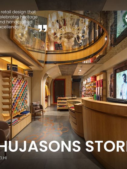 The Ahujasons store in New Delhi is a retail design that celebrates heritage and handcrafted excellence. The interior, draped in textured beige, features curved cut-outs that offer enticing glimpses of the upper levels, inviting customers on a journey through the brand's 45-year legacy.