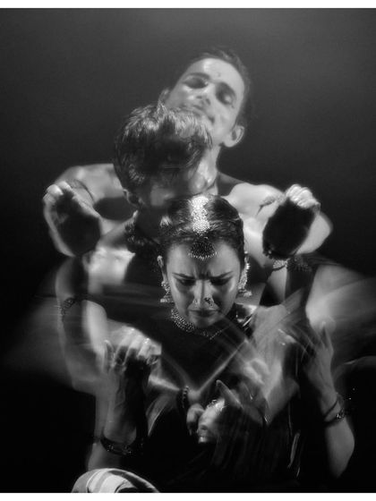 A motion-blur photo from 'Nagamandala' that conveys a sense of turmoil and internal conflict. Photography like this captures the emotional energy of the dance.