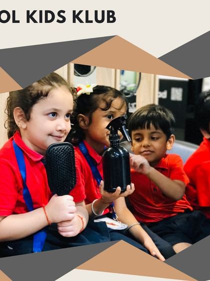 Children curiously playing with salon tools like brushes and spray bottles under supervision, making the experience interactive and fun.