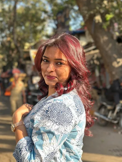 Taking the new cherry red hair out on the streets. This outdoor shot shows how vibrant the color looks in natural sunlight.