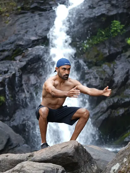 Taking my workout to one of the local waterfalls. This is what I mean by 'train anywhere'. Using nature as our gym for a bodyweight squat session is a perfect example of the functional fitness we practice on my retreats.