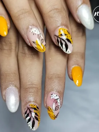 A trendy and artistic set combining solid yellow, pearl white, and abstract leaf patterns. This student work is ready for a magazine feature.