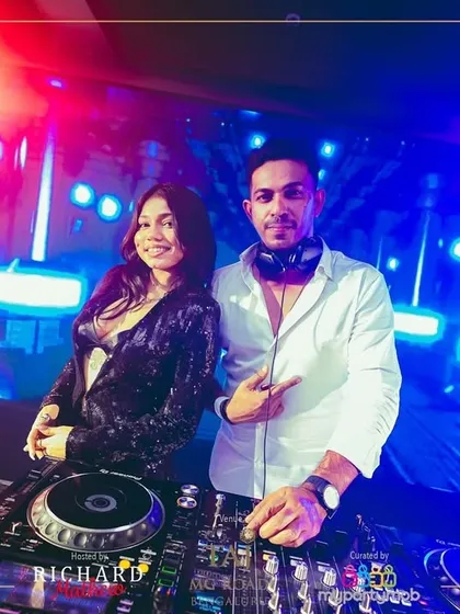 Another great shot with my co-DJ for the NYE party, with a stunning light show in the background.