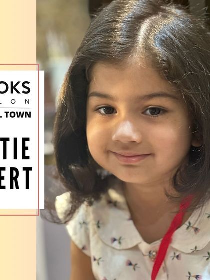 Another adorable shot of our young client, looking happy and stylish with her new haircut.