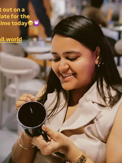 A participant holds her finished Kintsugi piece, a symbol of her solo date. It's a reminder that taking time for yourself to create and reflect can be incredibly rewarding.