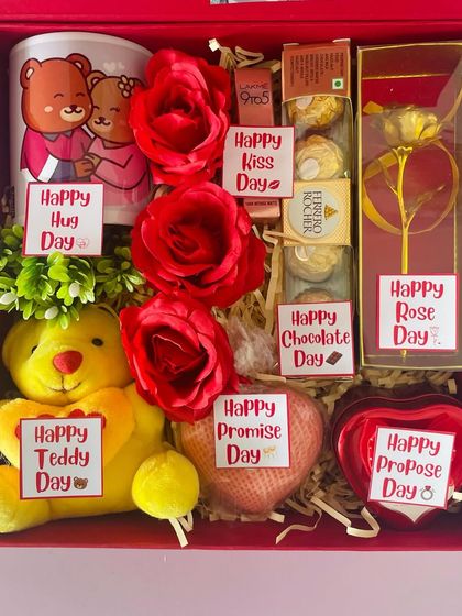 A look inside the 7-day Valentine's gift box. It includes tagged gifts for Rose Day, Teddy Day, Chocolate Day, and more.