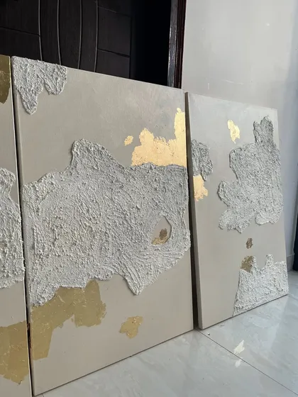 A set of four 3ft x 2ft canvases for a Mumbai home. This series features abstract islands of heavy texture on a neutral background, with accents of 24ct gold leaf peeking through.