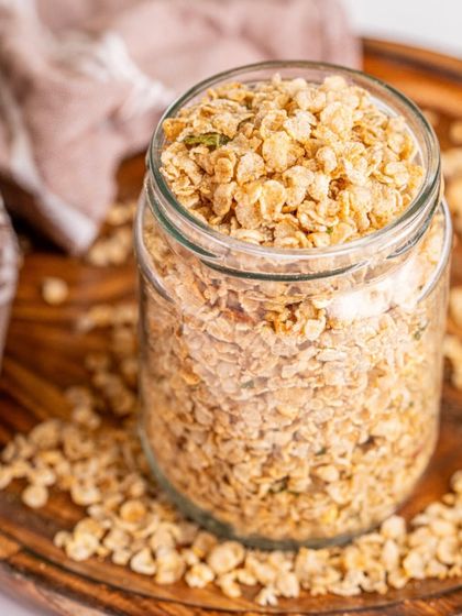 A jar filled with my crispy and flavorful Chivda. It's a perfect blend of taste and nutrition, ready to help you snack smarter.