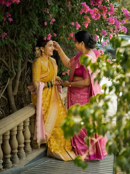 A tender moment between a bride and her mother before the ceremony begins. These quiet, emotional family moments are priceless treasures.