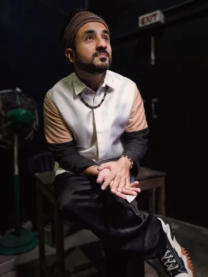 We had so much fun on set with the brilliant Vir Das for his Chennai show. This backstage shot captures a quiet moment before the performance. We styled him in a modern, color-blocked shirt from Maison Tai that reflects his unique and sharp personality.