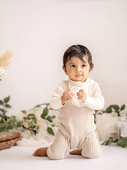 A duplicate of the happy baby in the minimalist boho setup.