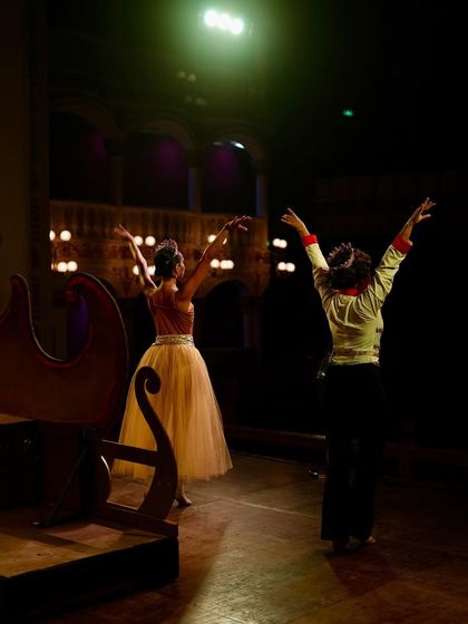 Rehearsing the royal dance on stage. Every movement is practiced to perfection to ensure the final performance is flawless.