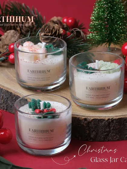 A beautifully styled shot of the 'Christmas in a Jar' candle set.