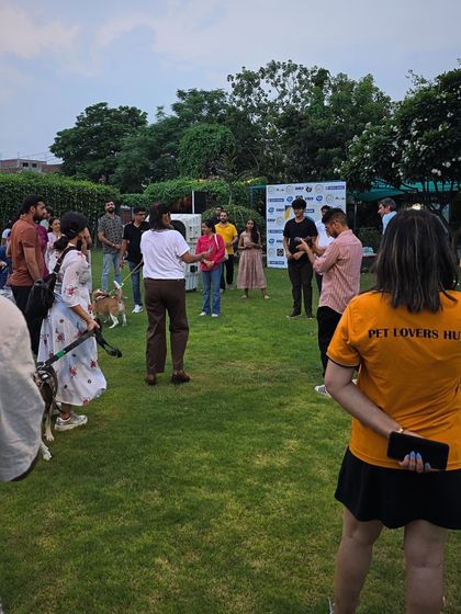 A view from behind the scenes, showing our staff ensuring the event runs smoothly. We are equipped to manage crowds and activities, making us a reliable choice for your next big pet-friendly gathering.